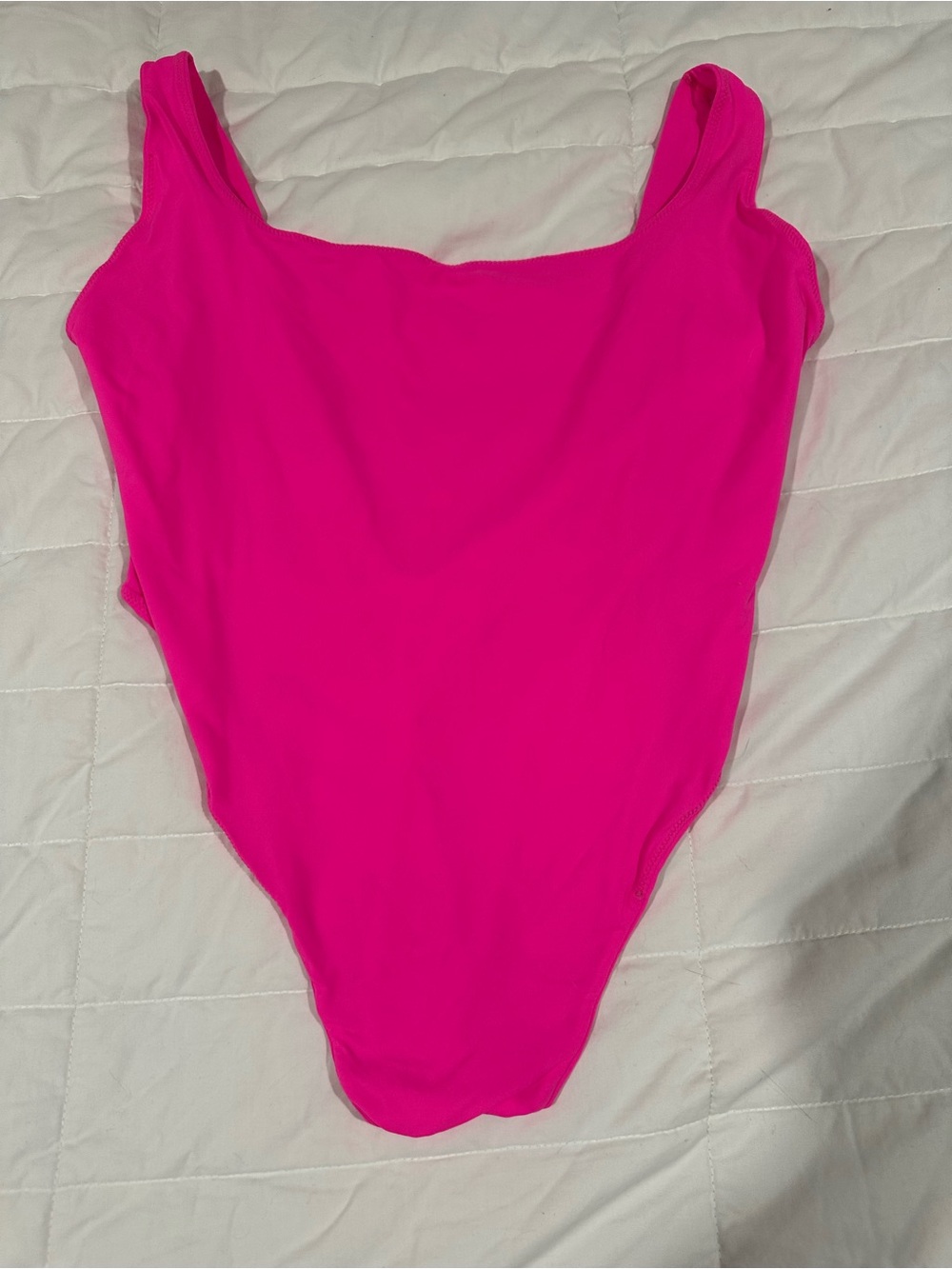 Hot pink SKIMS bodysuit